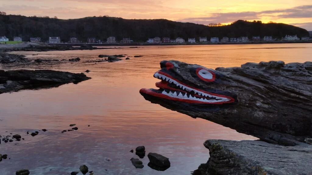 Crocodile Rock, the painted rock on the shore at Millport, Isle of Cumbrae